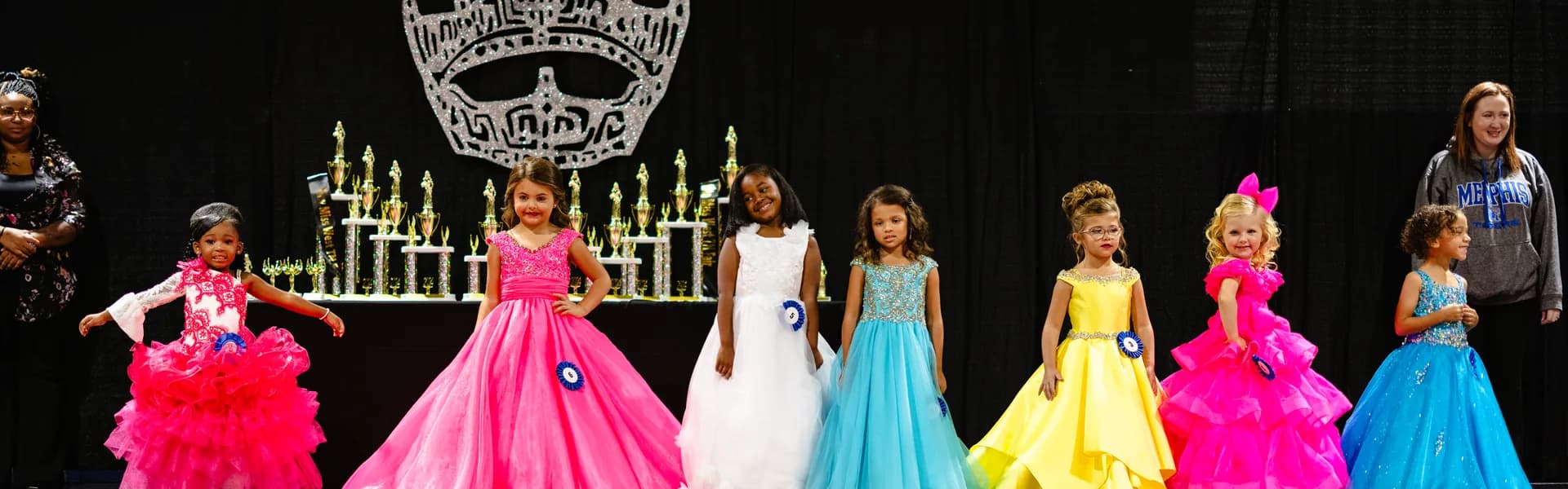 Pageant contestants lined up on stage at the West Tennessee State Fair